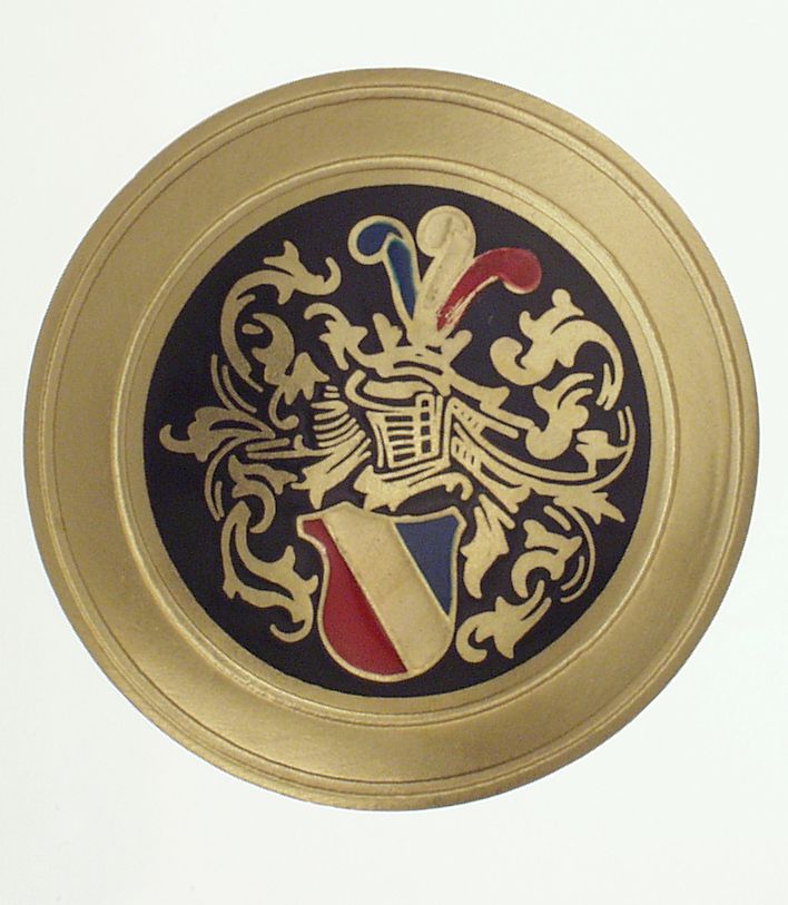 Couleur Bandknopf in gold mit schwarzem Emblem